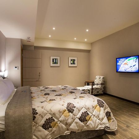 Verygood Business Hotel Huatan Rum bild
