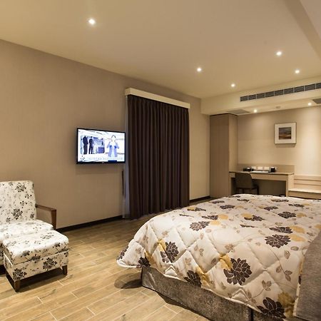 Verygood Business Hotel Huatan Rum bild