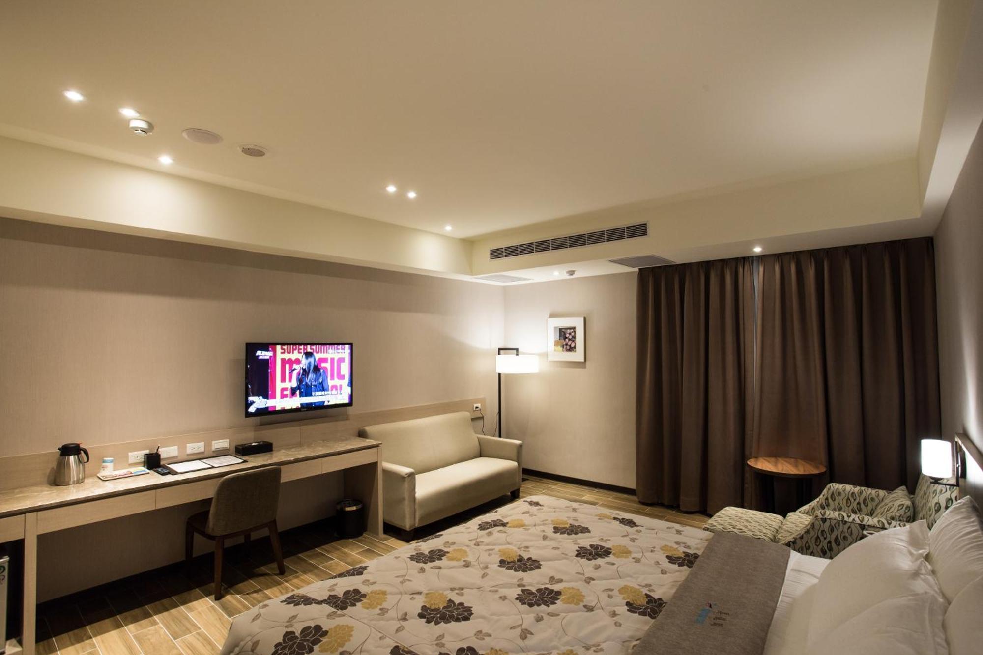 Verygood Business Hotel Huatan Rum bild