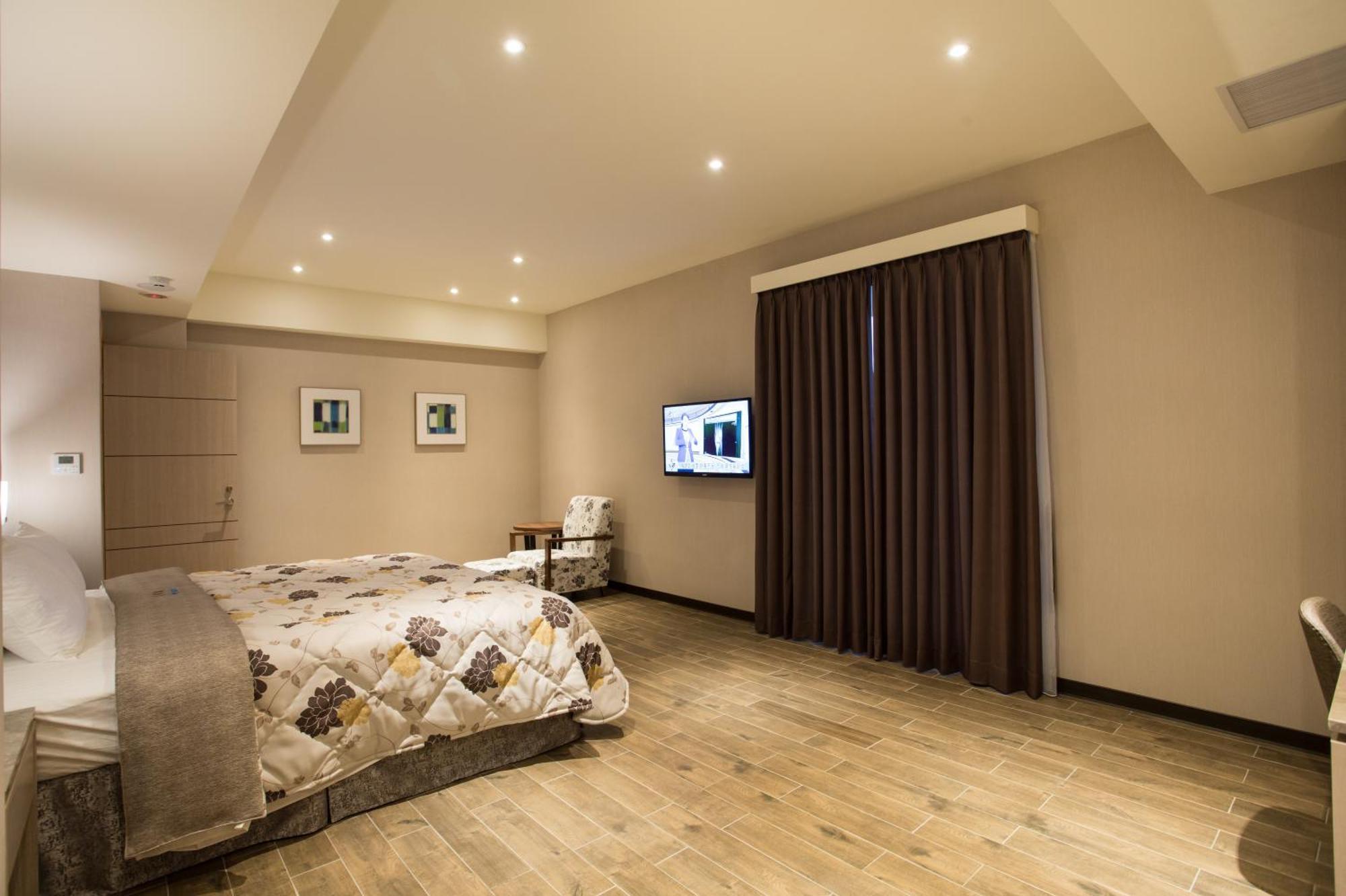 Verygood Business Hotel Huatan Rum bild